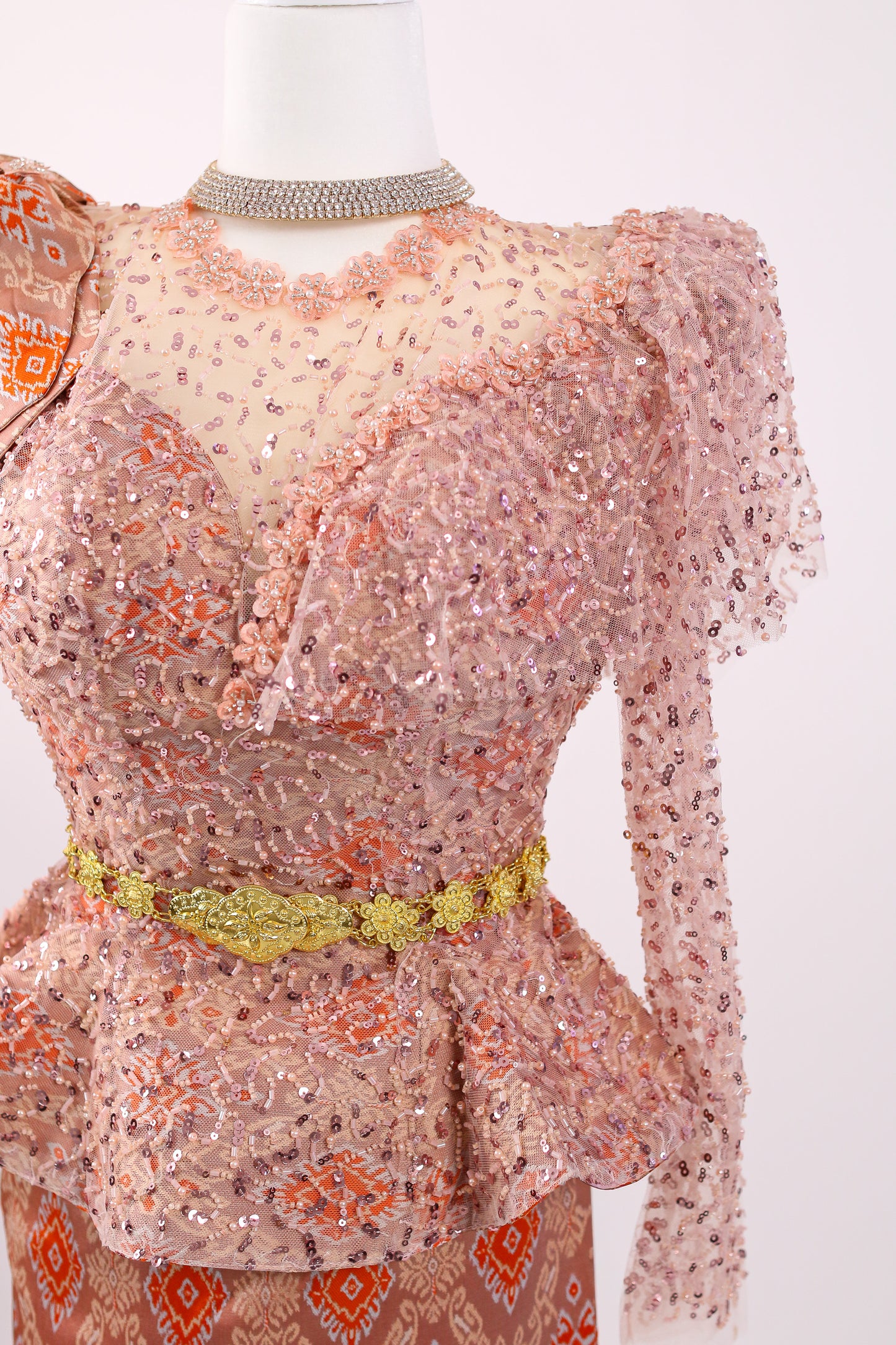 Decorative dress with floral patterns on a white background