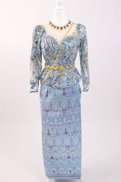 Floral patterned dress on a mannequin against a white background