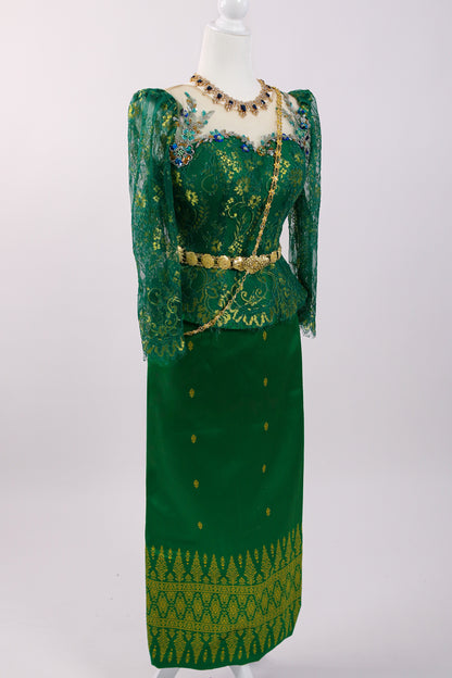 Green traditional outfit with intricate patterns on a white background