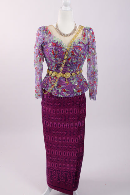 Purple patterned outfit with a matching skirt on a mannequin against a white background