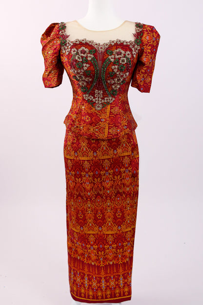 Red patterned dress on a white background